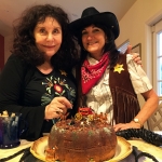 Karen with Linda of The Porter Valley Women's Book Club. Linda baked a delicious rum cake and built the model stagecoach you see decorating it. An amazing, creative talent!