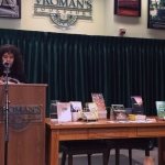 Karen reading the Wells Fargo stagecoach \'rules of the road\' to IWOSC (Independent Writers of Southern California) members at Vroman\'s Bookstore - August 3rd, 2014